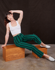 Alex is wearing Black Stripe Work Pants in Hunter and vintage off-white Cropped Tank Top