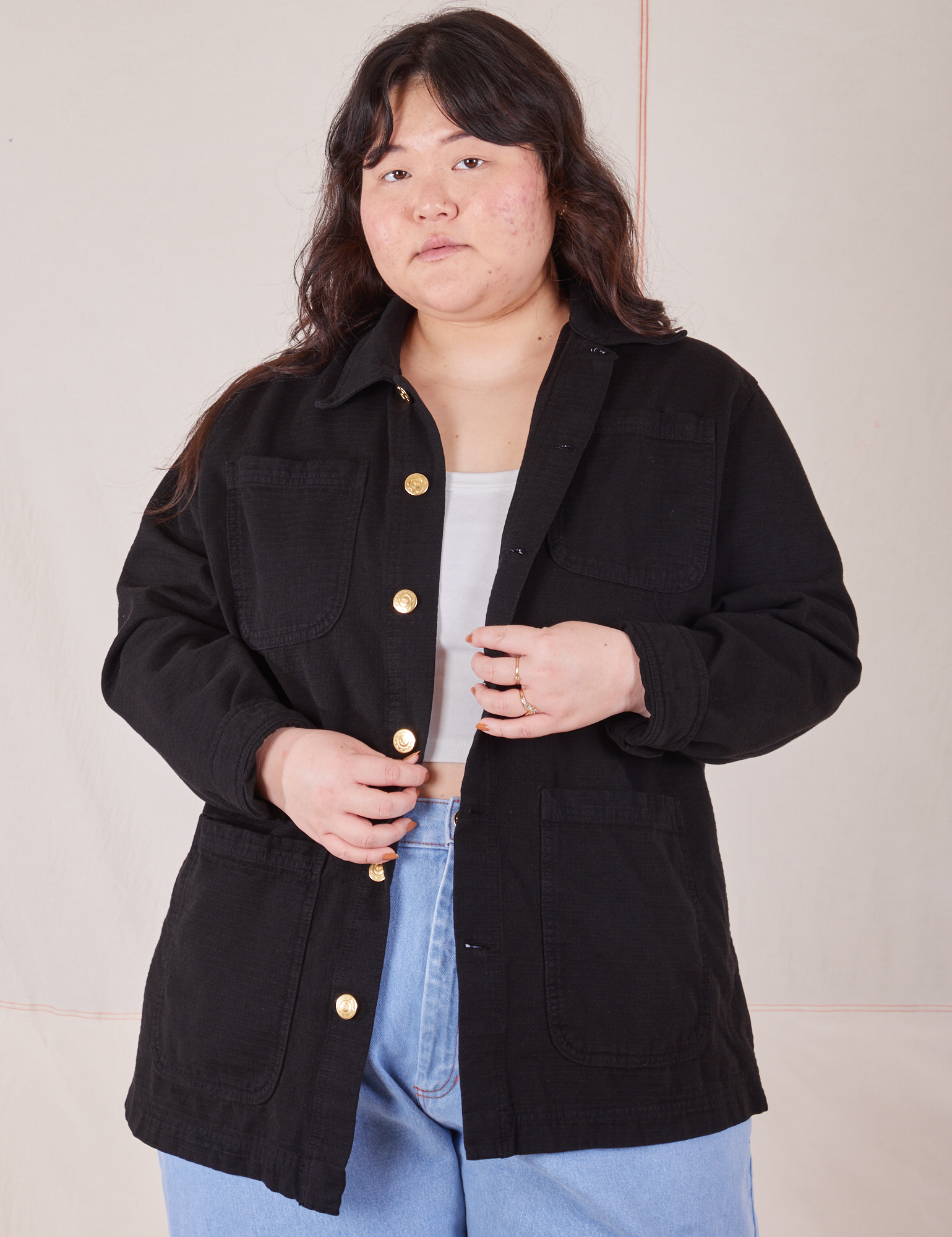 Ashley is 5&#39;7&quot; and wearing size S Field Coat in Basic Black