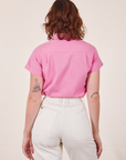 Back view of Pantry Button-Up in Bubblegum Pink worn by Alex