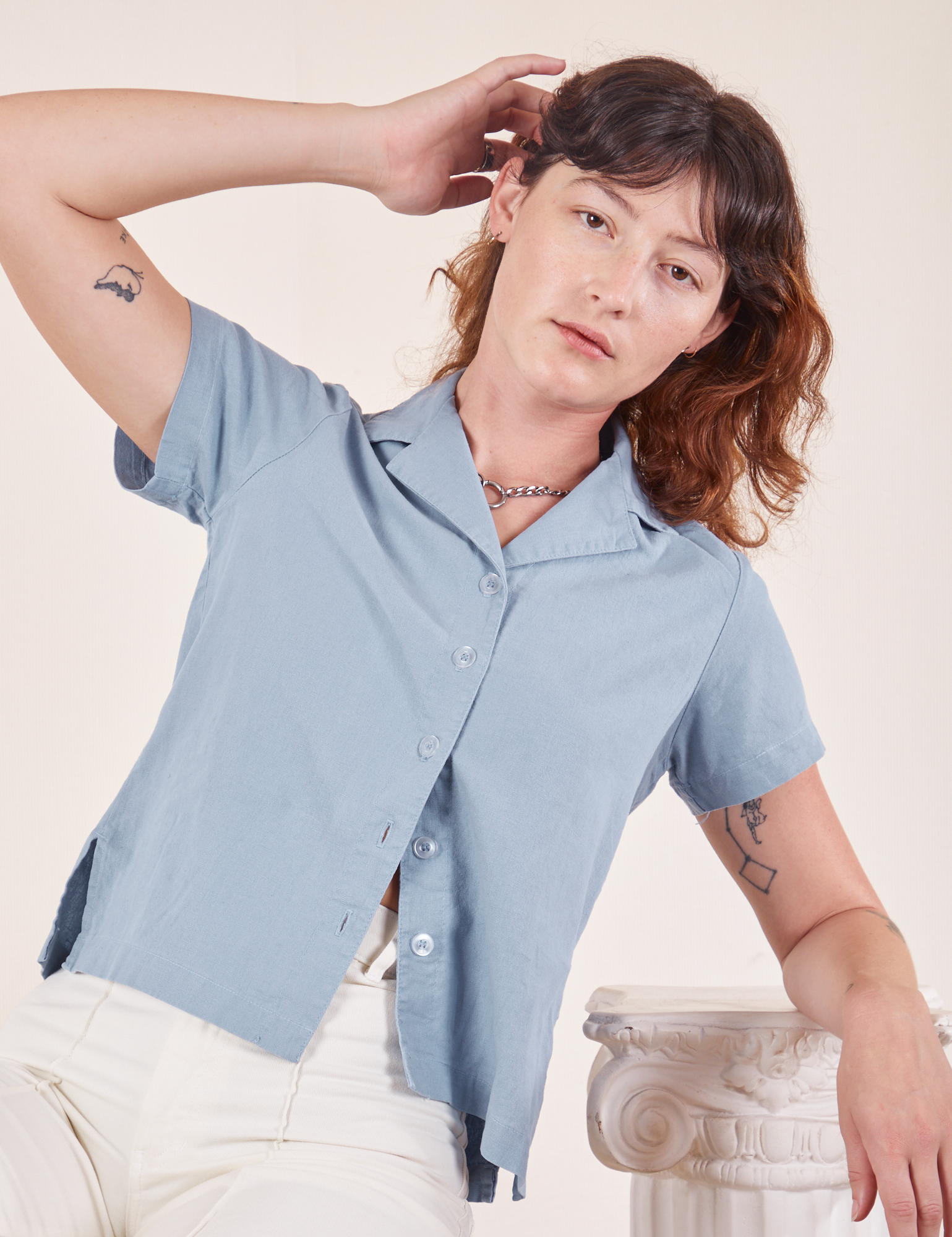 Alex is wearing Pantry Button-Up in Periwinkle