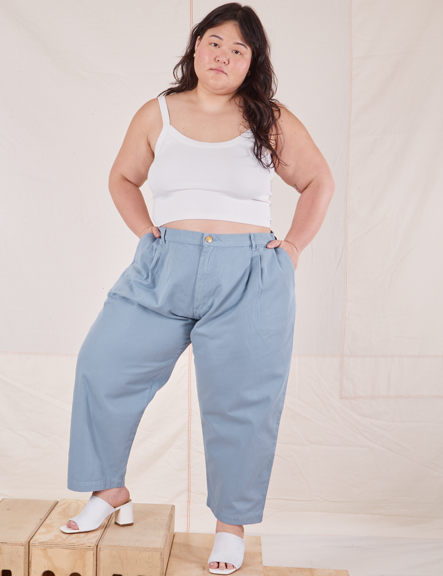 Ashley is 5&#39;7&quot; and wearing 1XL Petite Heavyweight Trousers in Periwinkle paired with vintage off-whit Cropped Cami