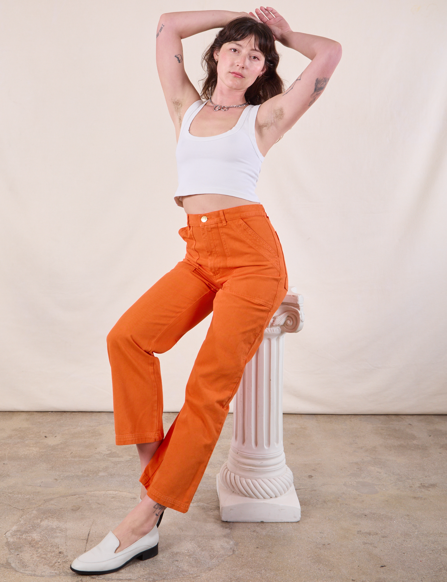 Work Pants in Construction Orange and Cropped Tank in Vintage Tee Off-White worn by Alex