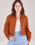 Hana is 5’3” and wearing P Ricky Jacket in Burnt Terracotta