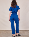 Short Sleeve Jumpsuit in Royal Blue back view on Alex