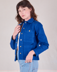 Angled front view of. Denim Work Jacket in Royal Blue on Alex