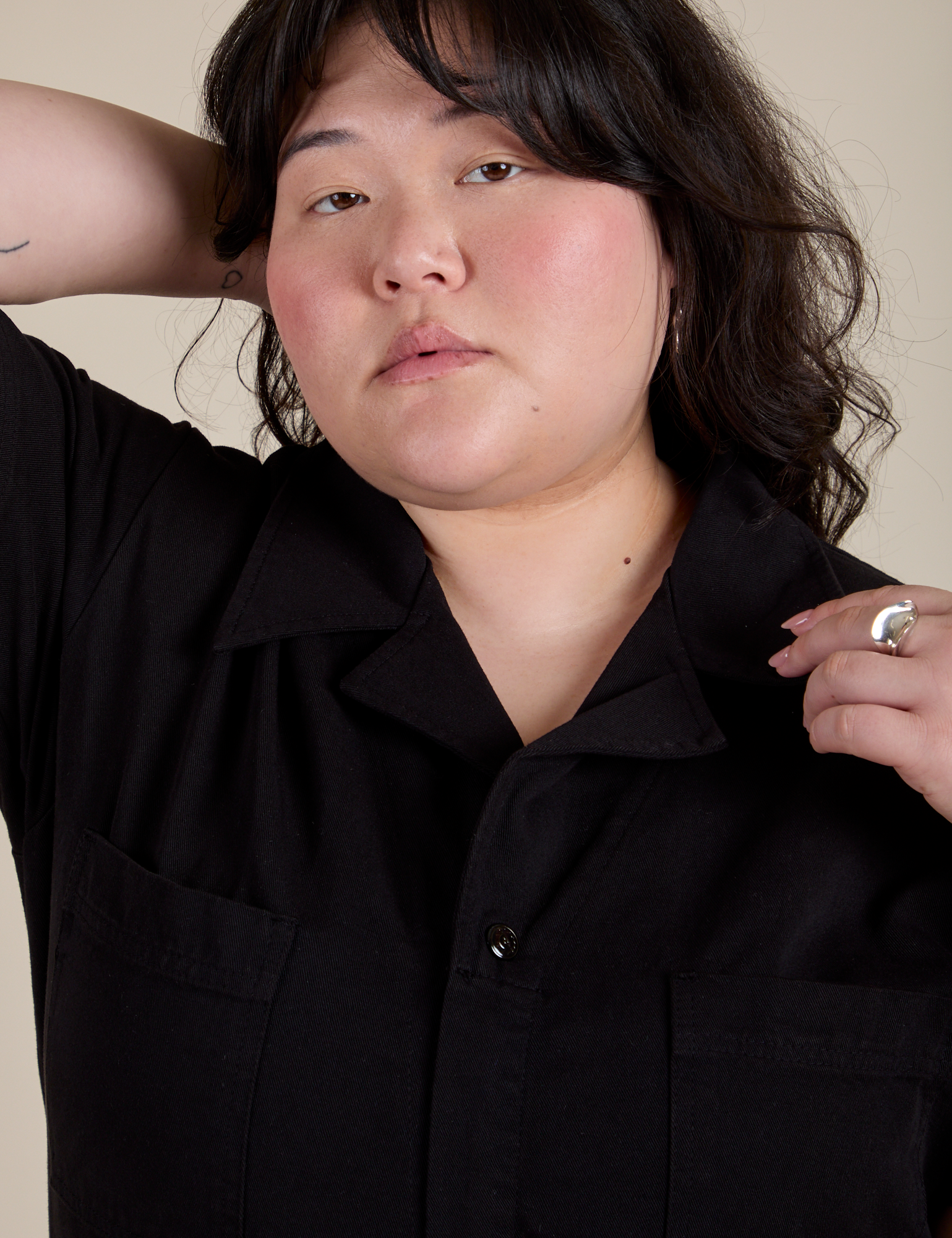 Short Sleeve Jumpsuit in Basic Black front close up on Ashley