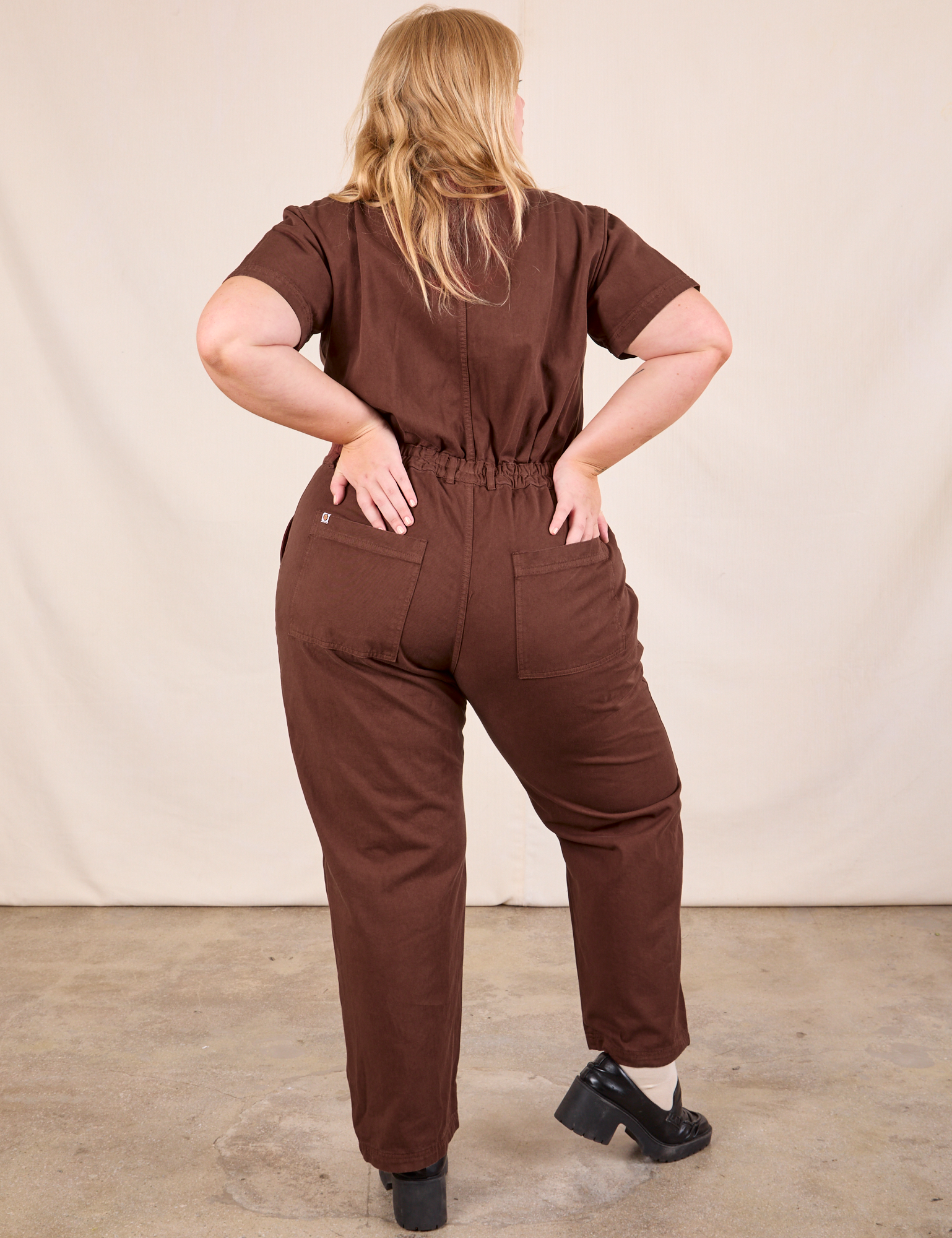 Short Sleeve Jumpsuit in Fudgesicle Brown back view on Juliet