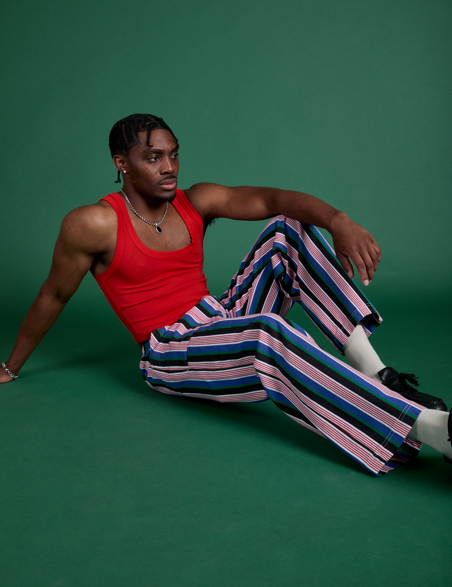 Work Pants in Pacific Stripe and mustang red Cropped Tank on Isaac