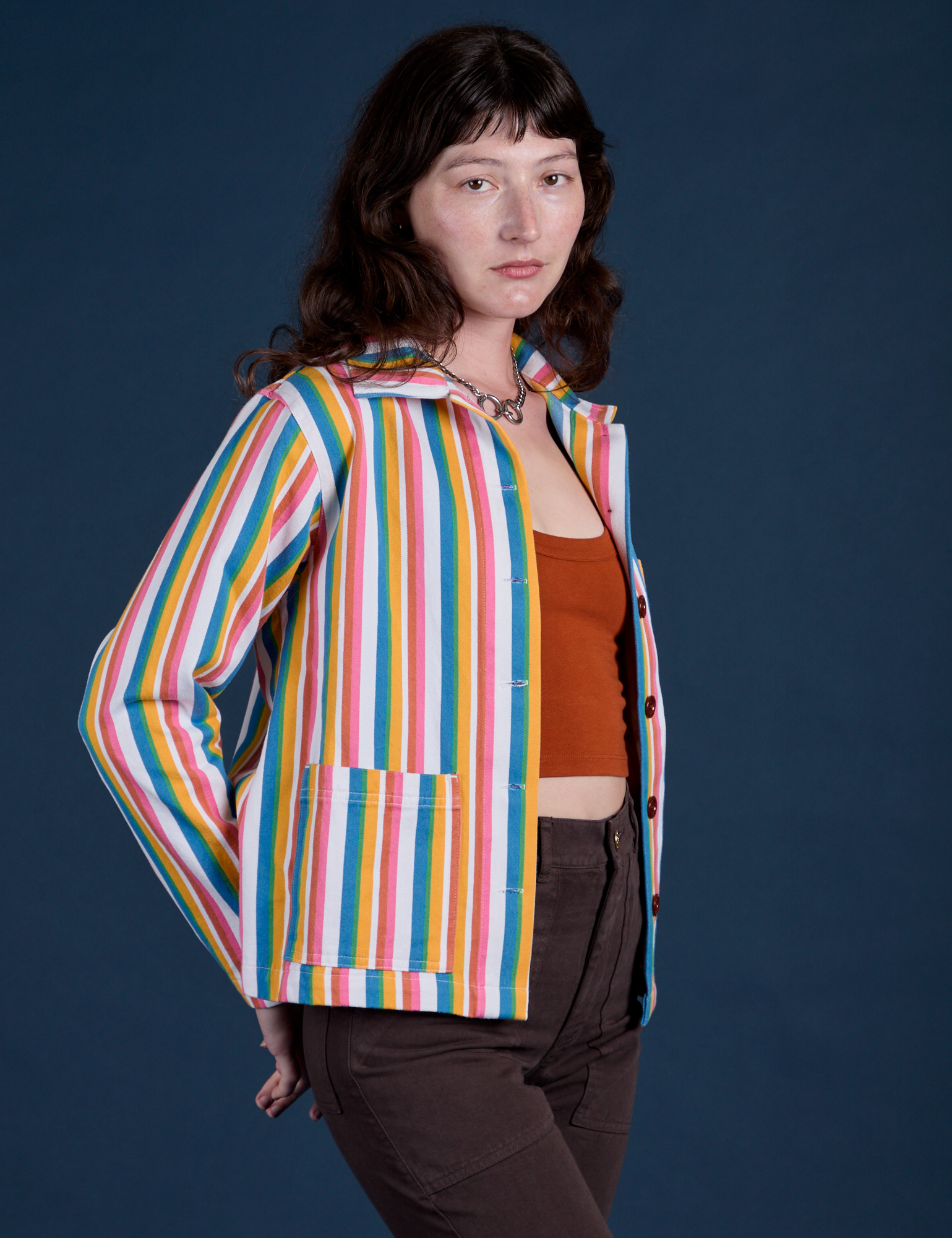 Angled front view of Stripe Work Jacket in Rainbow Stripe on Alex