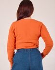 Back view of Honeycomb Thermal in Construction Orange on Betty