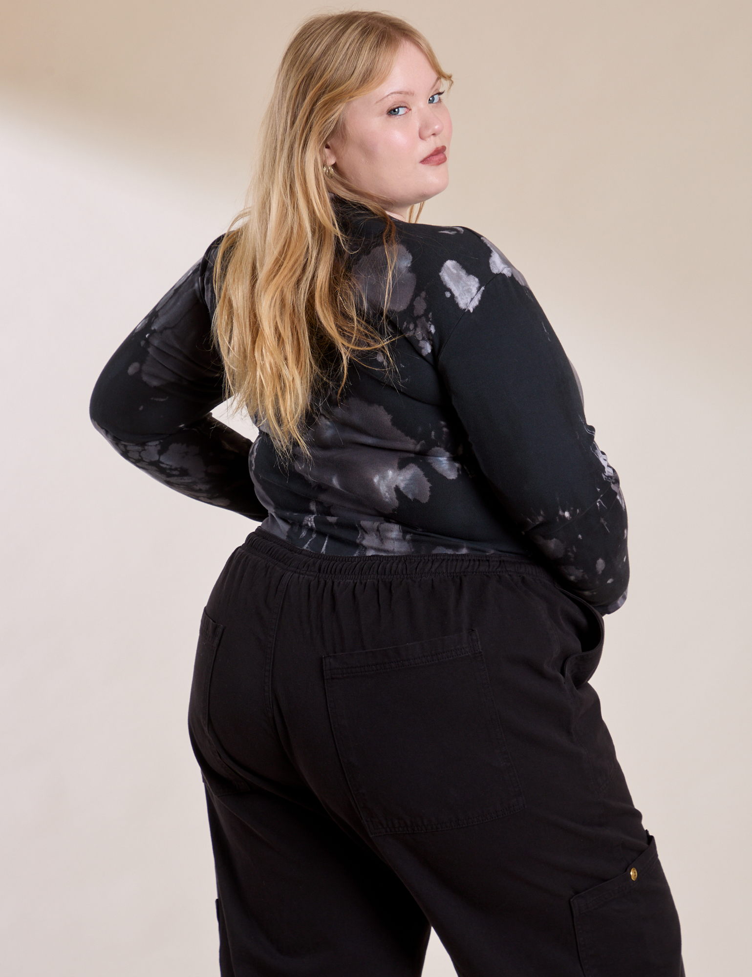 Long Sleeve Baby Tee in Ink Blot angled back view on Juliet