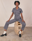 Cheyann is wearing Short Sleeve Jumpsuit in Washed Grey