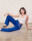 Alex is wearing Wide Leg Sweat Pants in Royal Blue and Cropped Tank in vintage tee off-white