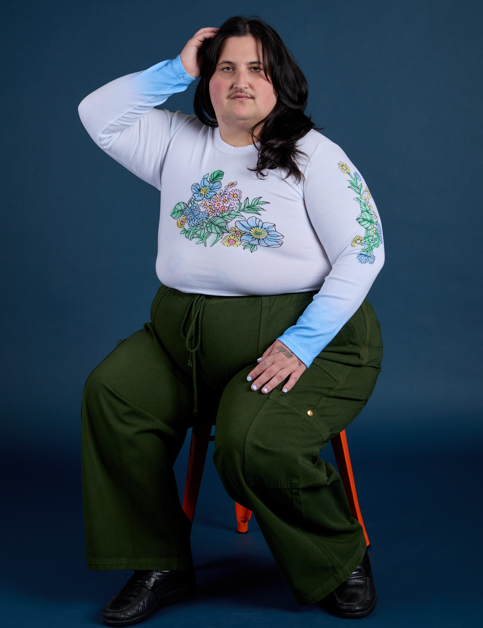 Floral Long Sleeve Baby Tee in Baby Blue and evergreen Drop Pocket Cargo Pants on Sam