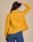 Denim Work Jacket in Mustard Yellow back view on Alex