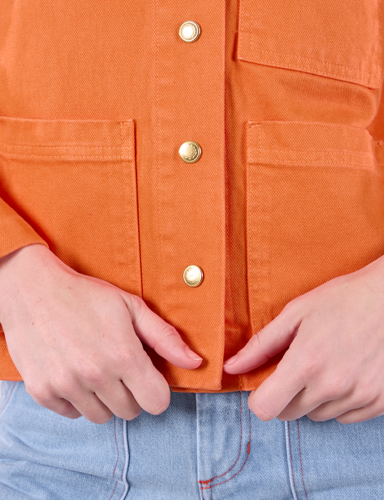 Denim Work Jacket in Construction Orange front close up on Alex