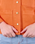 Denim Work Jacket in Construction Orange front close up on Alex