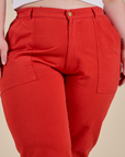 Work Pants in Mustang Red front close up on Ashley