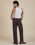 Back view of Work Pants in Espresso Brown and vintage tee white Cropped tank on Jesse