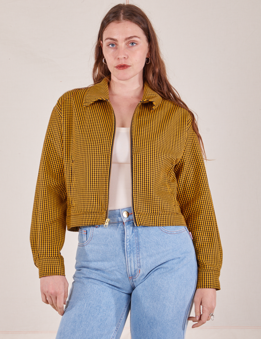 Allison is 5'10" and wearing XXS Ricky Jacket in Checker Yellow paired with vintage off-white Tank Top