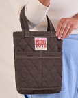 Quilted Mini Tote in Espresso Brown on model's arm