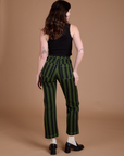 Back view of Black Stripe Work Pants in Evergreen on Alex