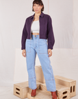 Tiara is wearing Ricky Jacket in Nebula Purple and vintage tee off-white Cami and light wash Carpenter Jeans