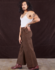 Side view of Overdyed Wide Leg Trousers in Brown and vintage off-white Cami on Jesse