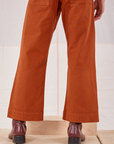 Action Pants in Burnt Terracotta back pant leg close up on Jesse