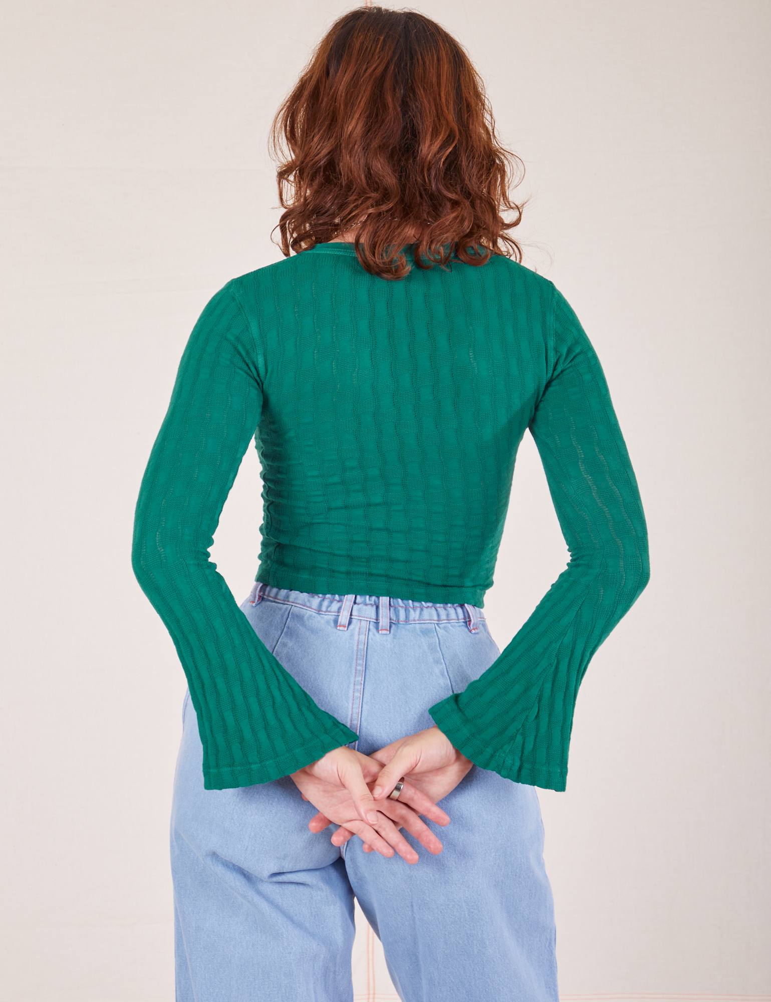 Back view of Bell Sleeve Top in Hunter Green worn by Alex