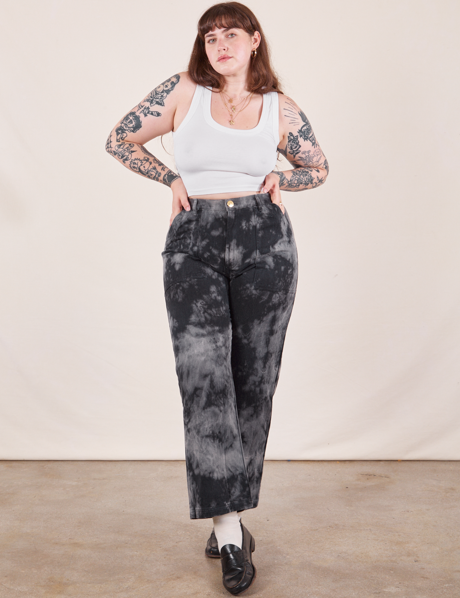 Sydney is wearing Black Magic Waters Work Pants and vintage off-white Cropped Tank Top