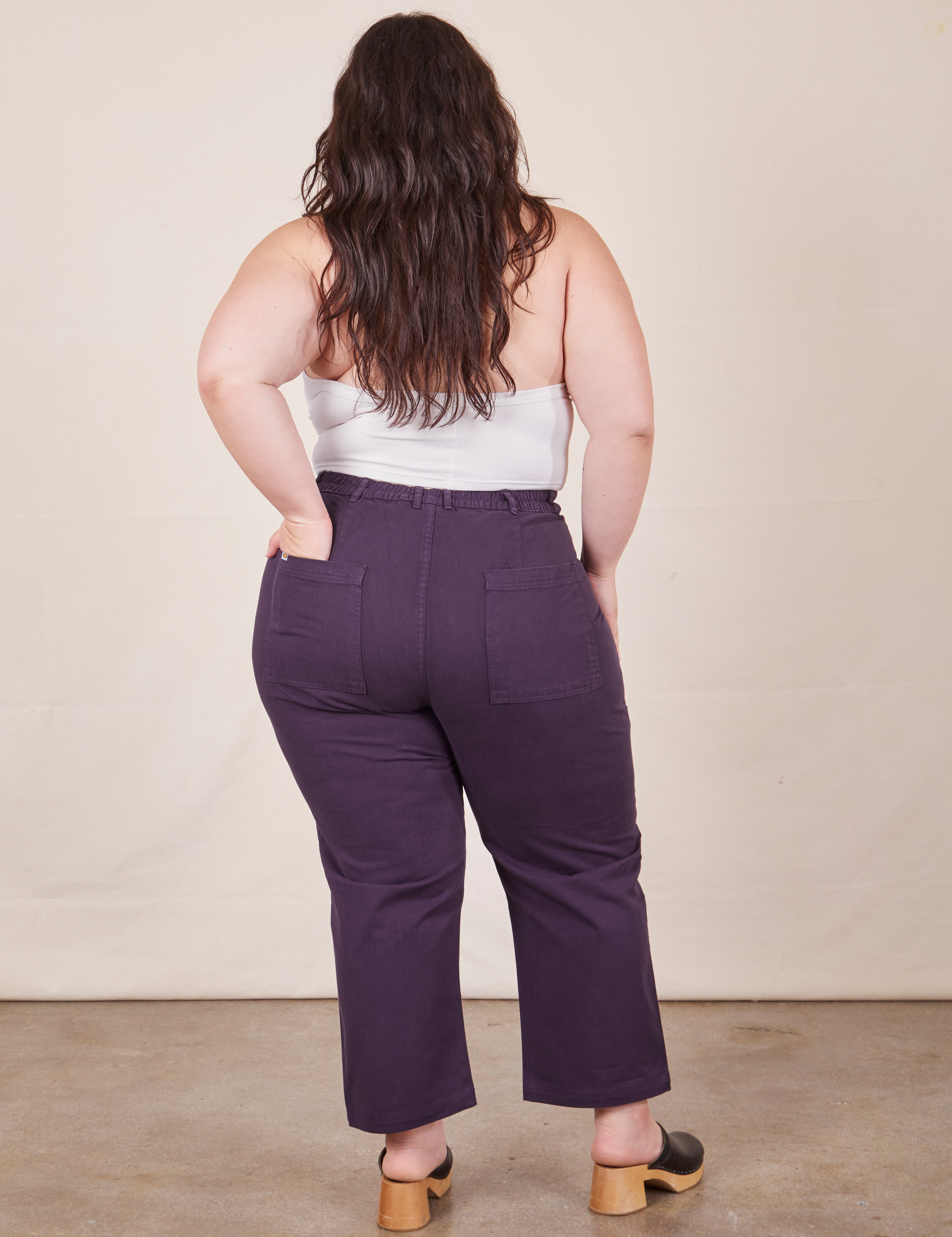Back view of Petite Work Pants in Nebula Purple worn by Ashley