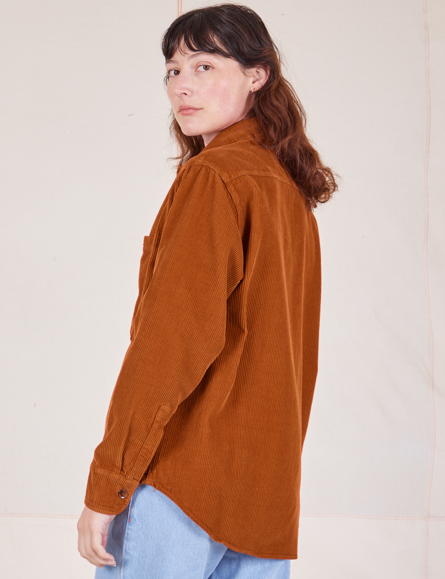 Side view of Corduroy Overshirt in Burnt Terracotta on Alex