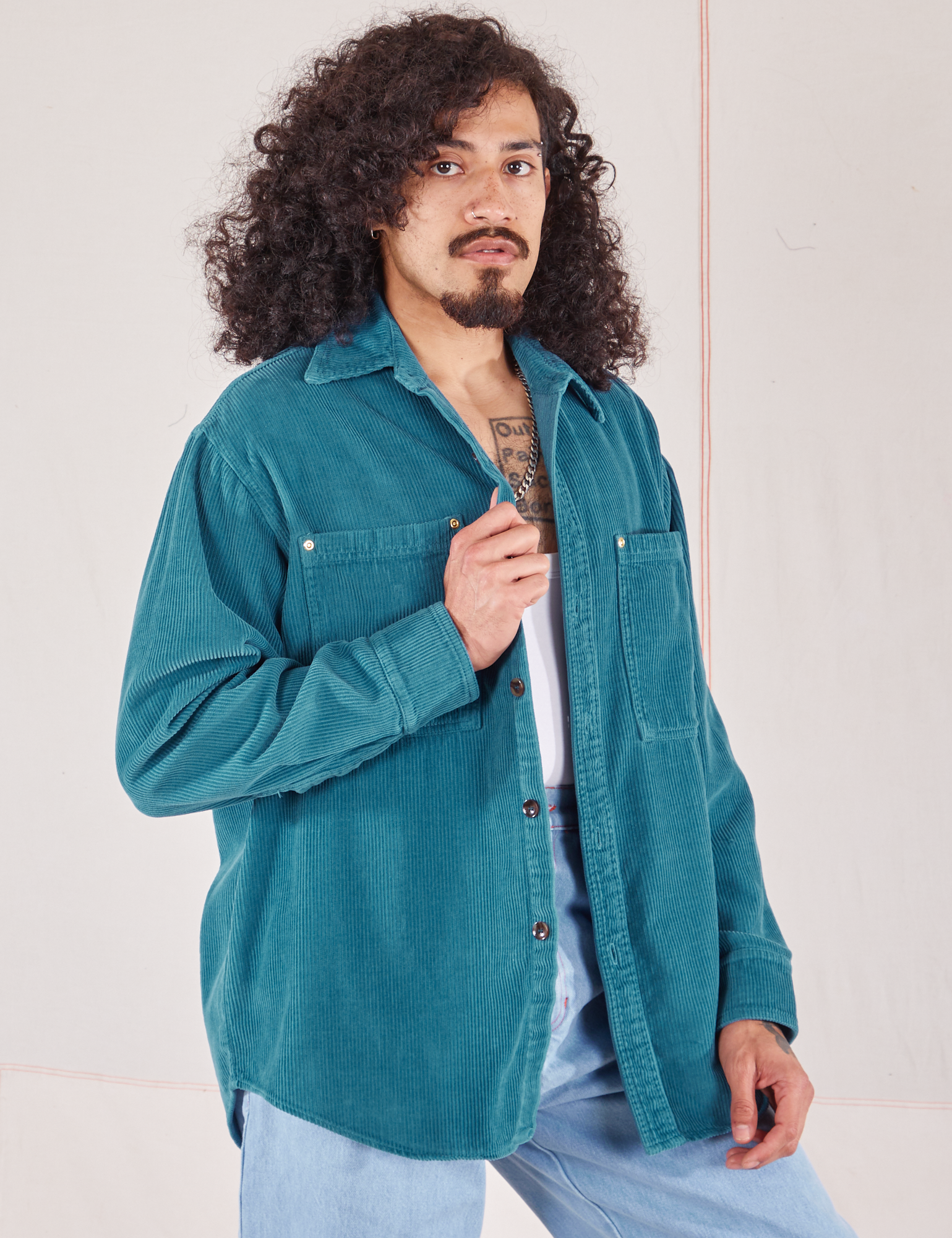 Angled front view of Corduroy Overshirt in Marine Blue on Jesse