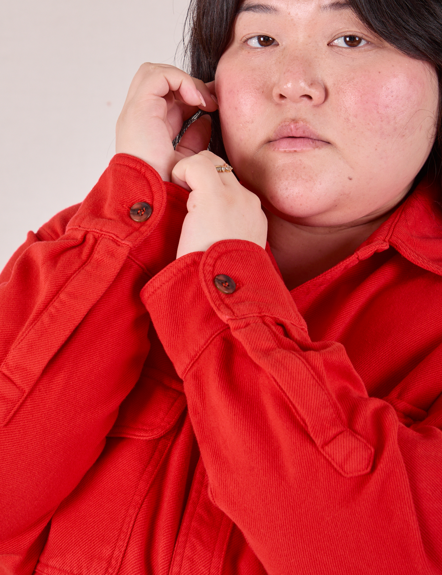 Flannel Overshirt in Mustang Red sleeve close up on Ashley