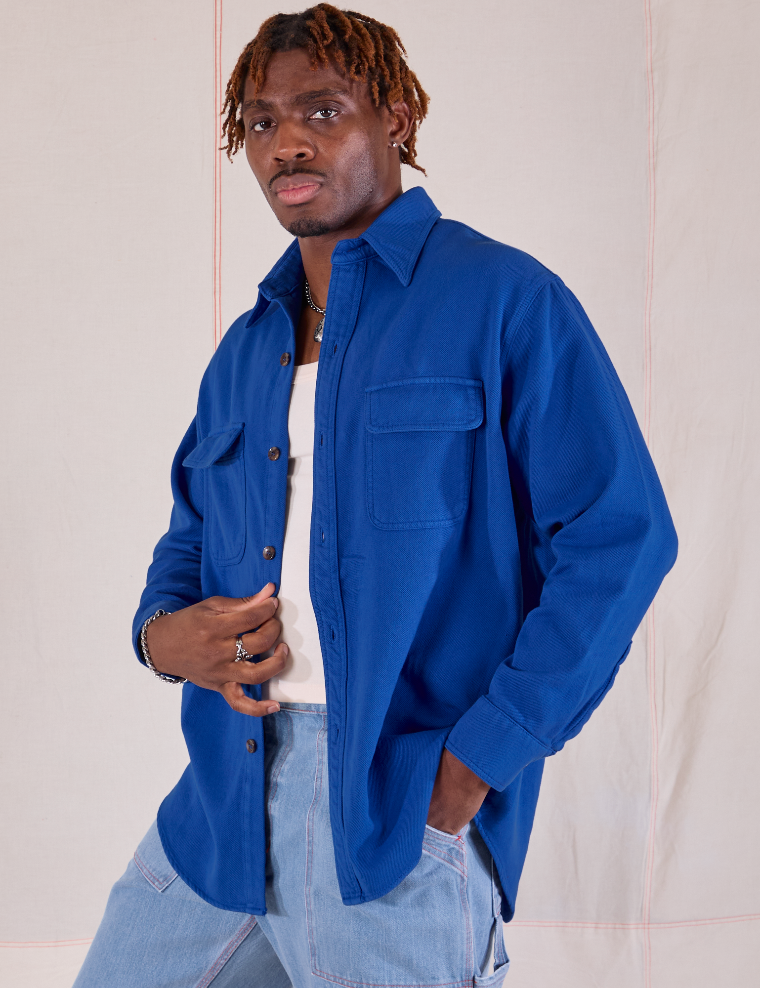 Flannel Overshirt in Royal Blue angled front view on Isaac