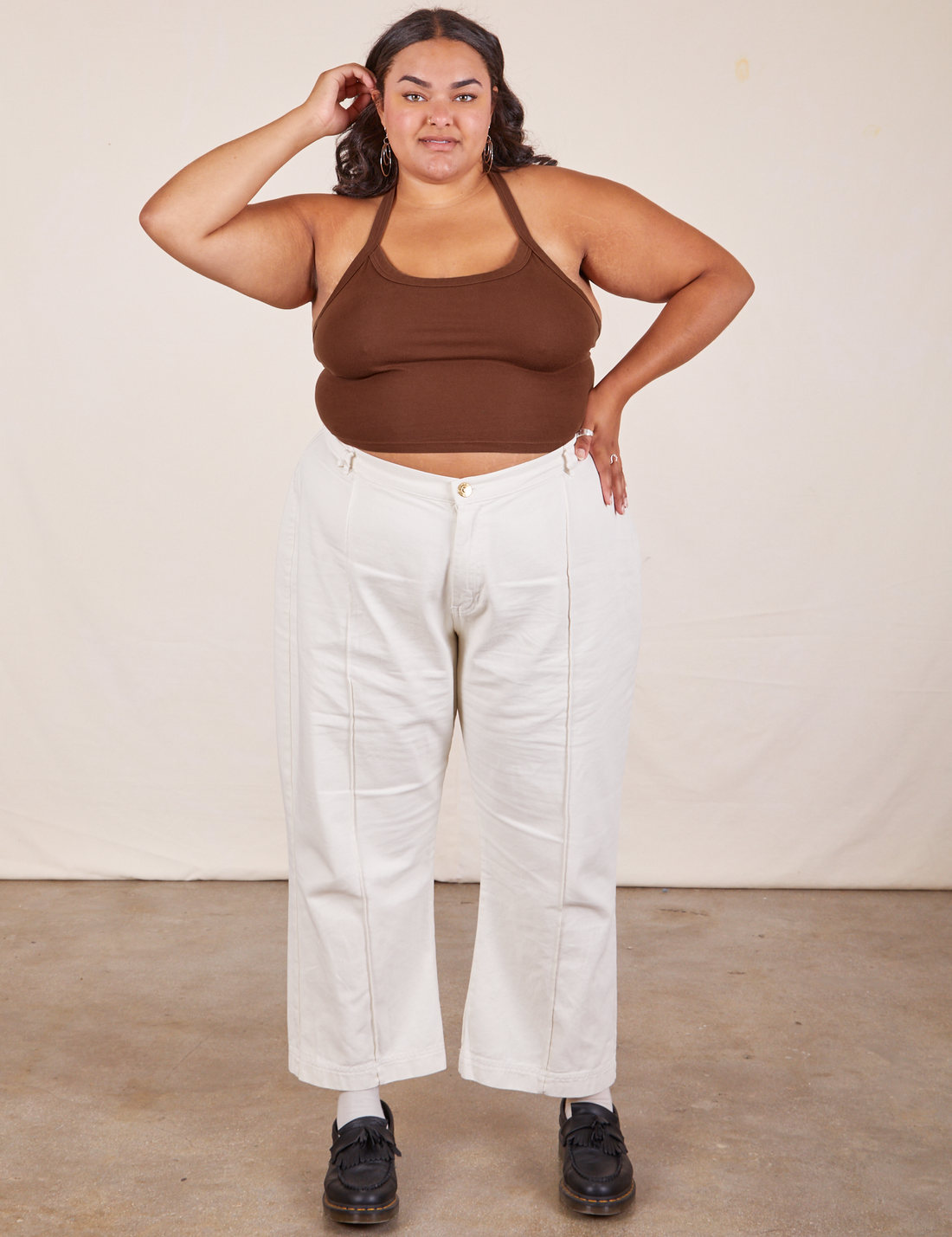 Alicia is wearing Halter Top in Fudgesicle Brown and vintage off-white Western Pants