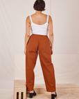 Back view of Heavyweight Trousers in Burnt Terracotta and vintage off-white Cropped Cami worn by Tiara