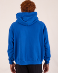 Oversized Hoodie in Royal Blue back view on Issac