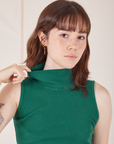 Front close up of Sleeveless Essential Turtleneck in Hunter Green on Hana