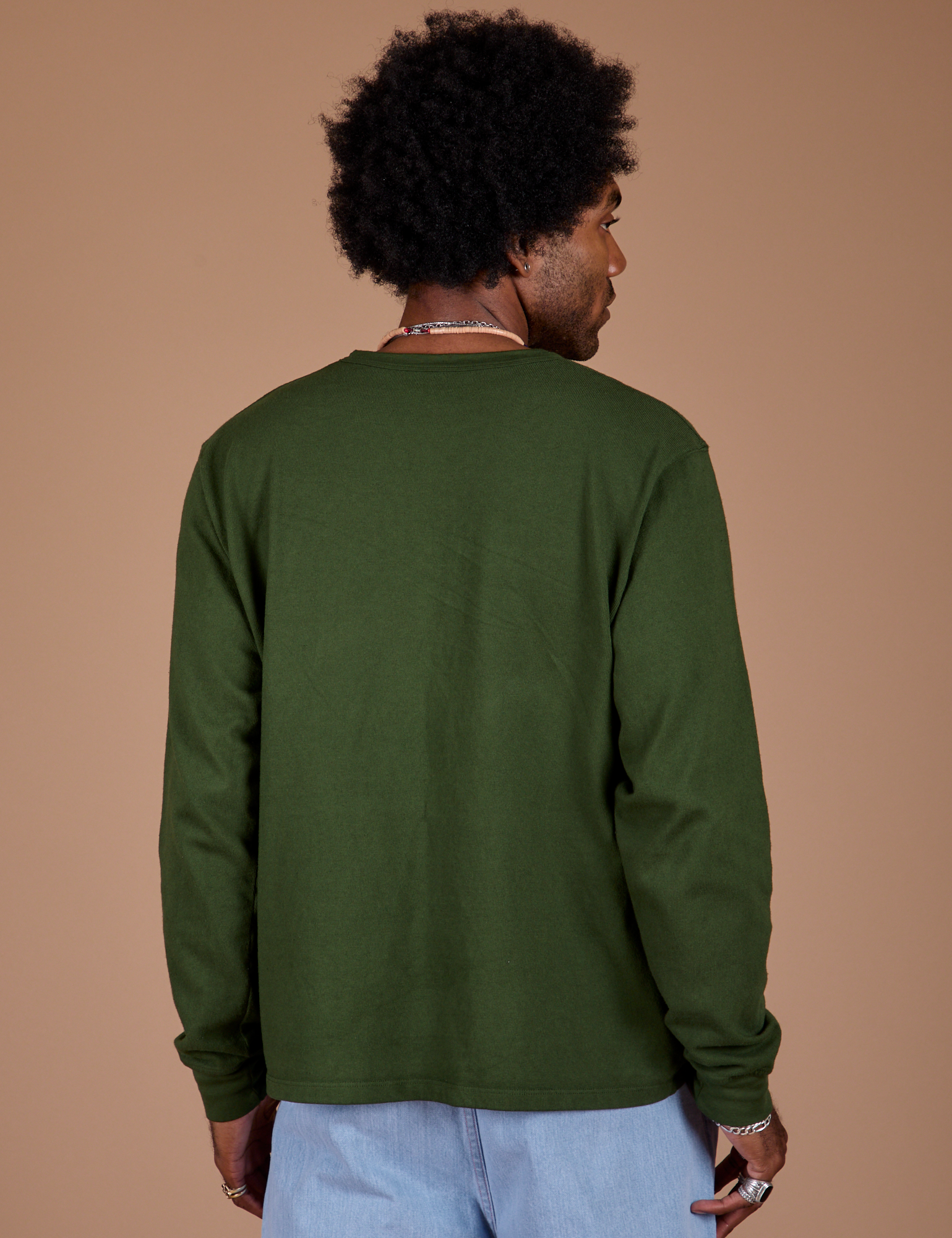 Long Sleeve Burly Tee in Evergreen back view on Jerrod