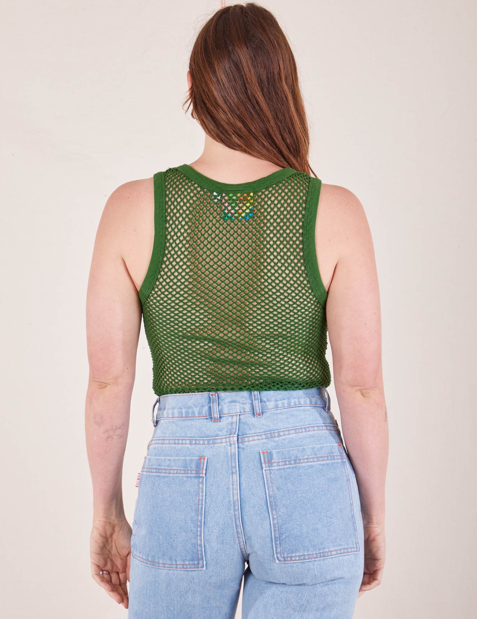 Back view of Mesh Tank Top in Lawn Green worn by Allison