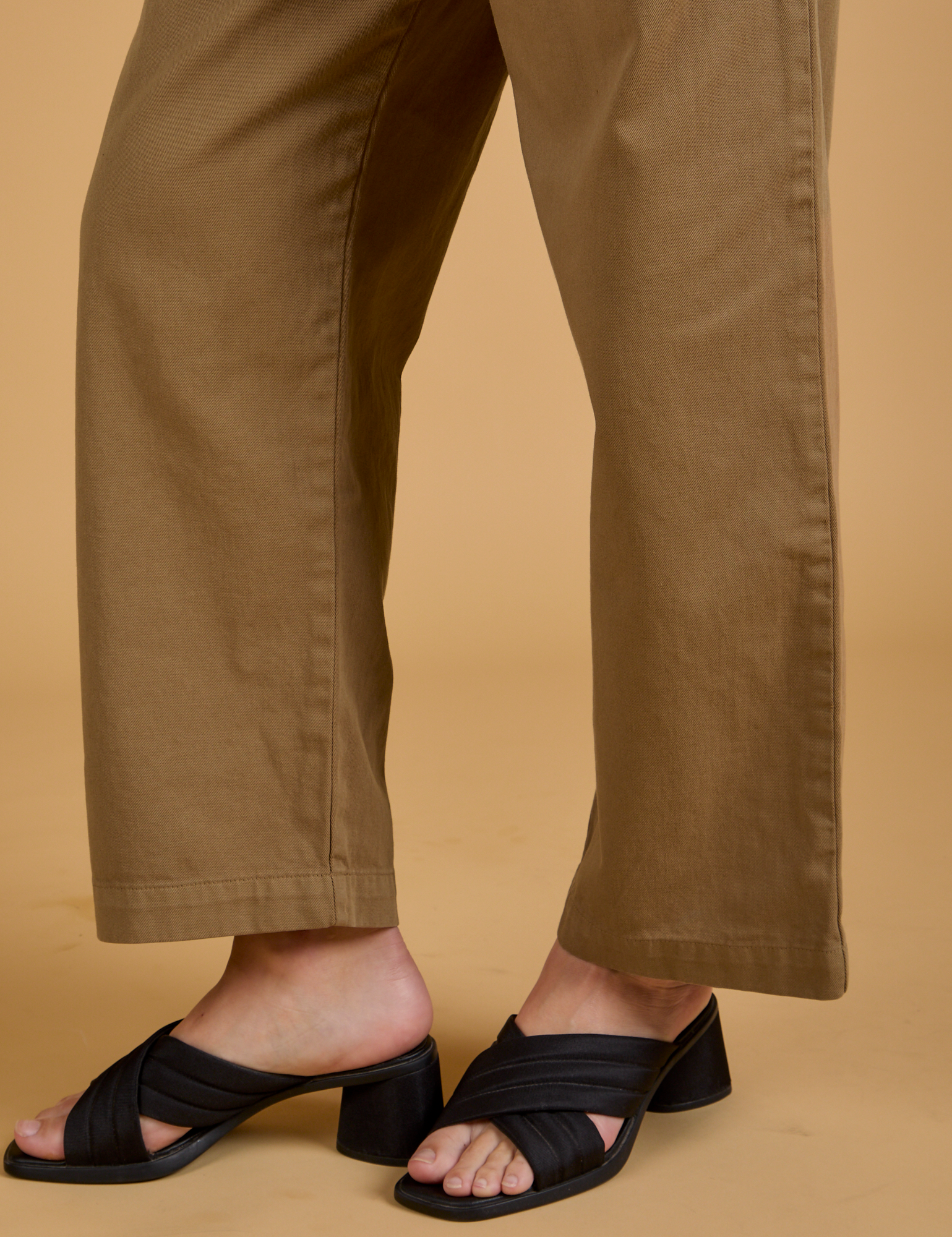 Baggy Mid-Rise Trousers in Desert Brown pant leg close up on Alex