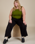 Muscle Tee in Summer Olive and black Drop Pocket Cargo Pants worn by Juliet