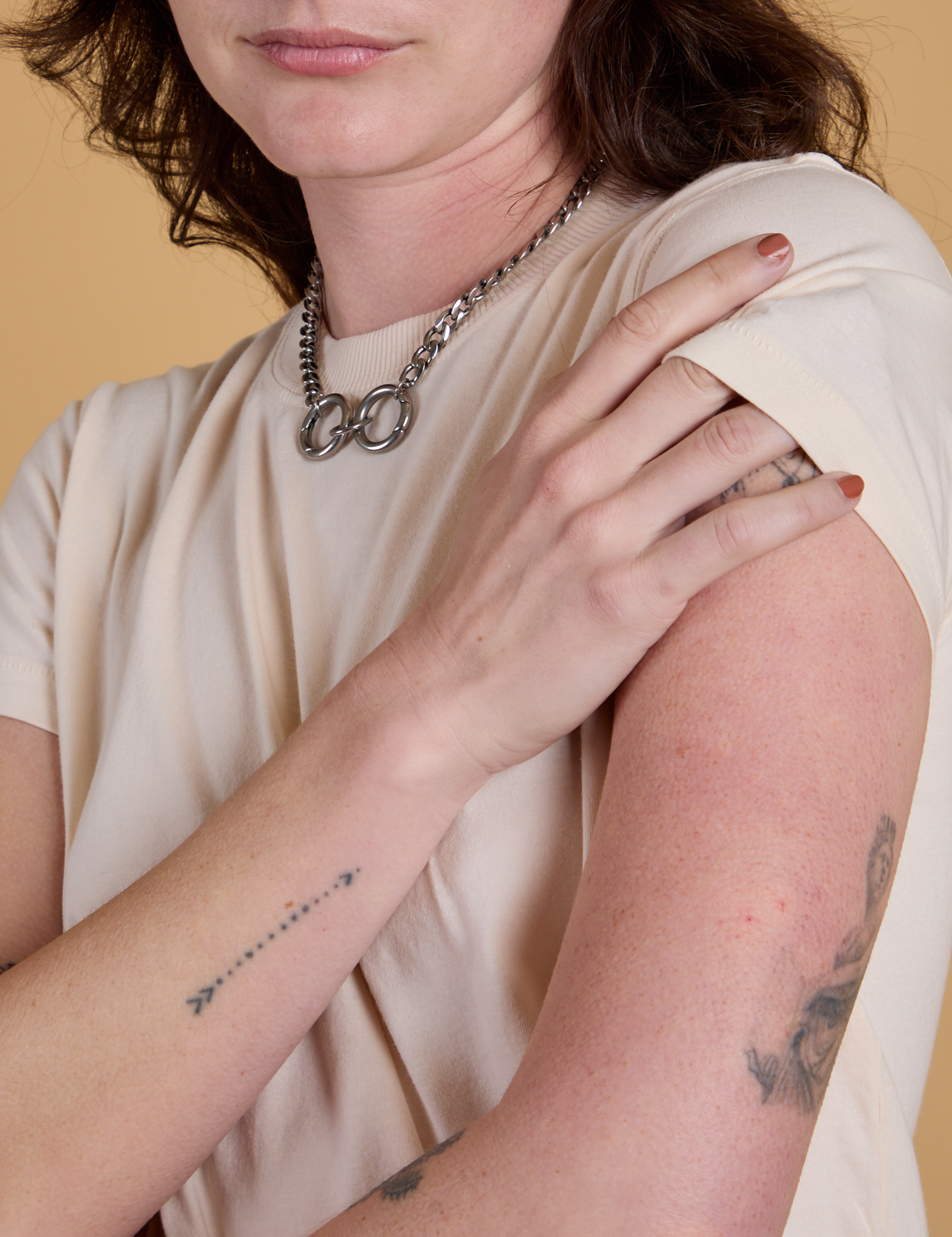 Angled view close up of Organic Vintage Tee in Vintage Off White on Alex