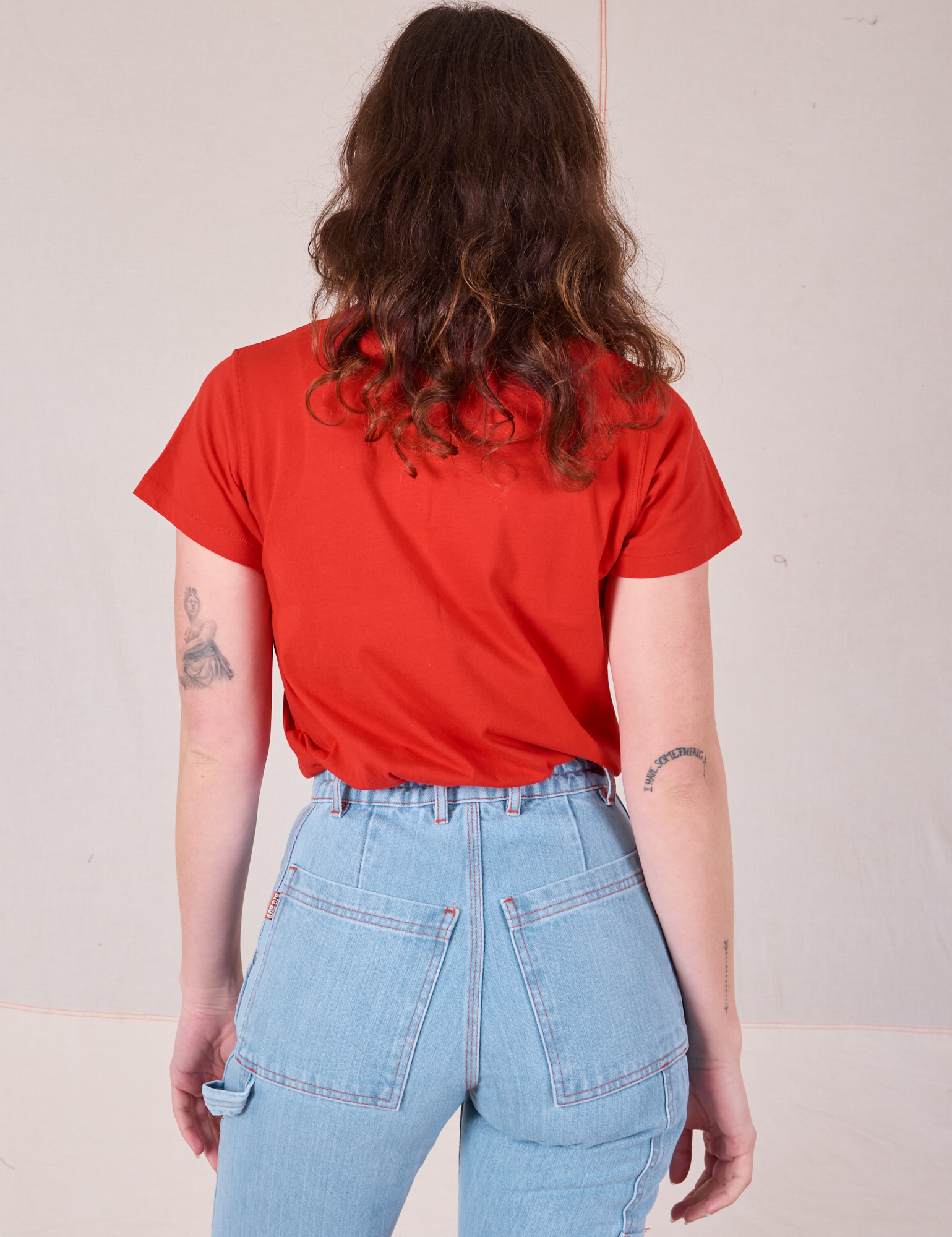 Back view of Organic Vintage Tee in Mustang Red on Alex