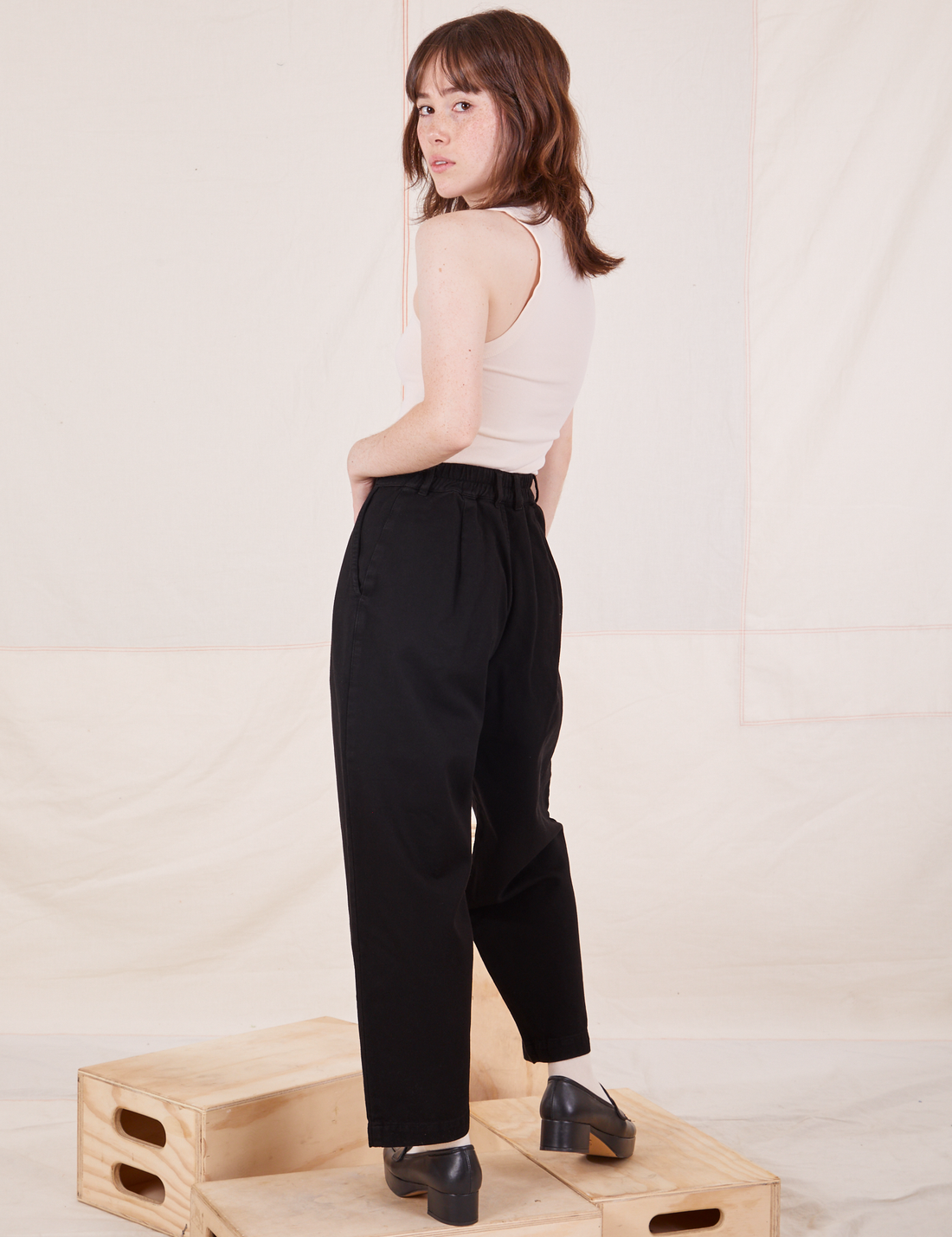Back view of Organic Trousers in Basic Black worn by Hana