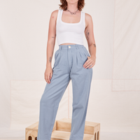 Alex is wearing Organic Trousers in Periwinkle and vintage off-white Cropped Tank Top