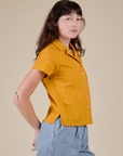 Pantry Button-Up in Mustard Yellow side view on Alex