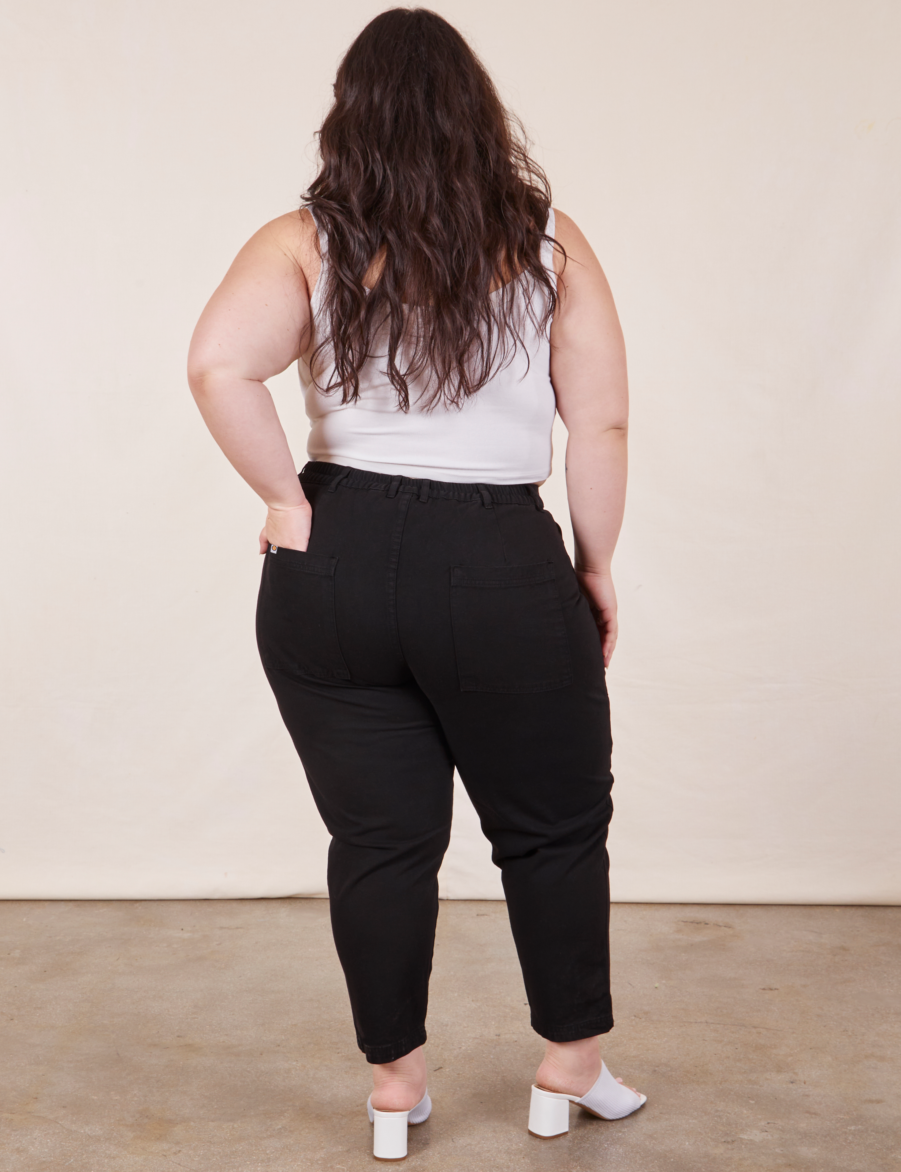 Back view of Petite Pencil Pants in Basic Black on Ashley